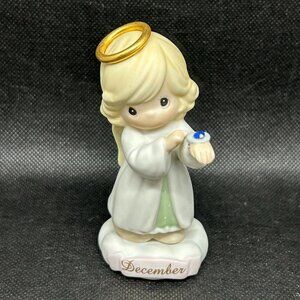 Precious Moments “December" birthstone angel figurine